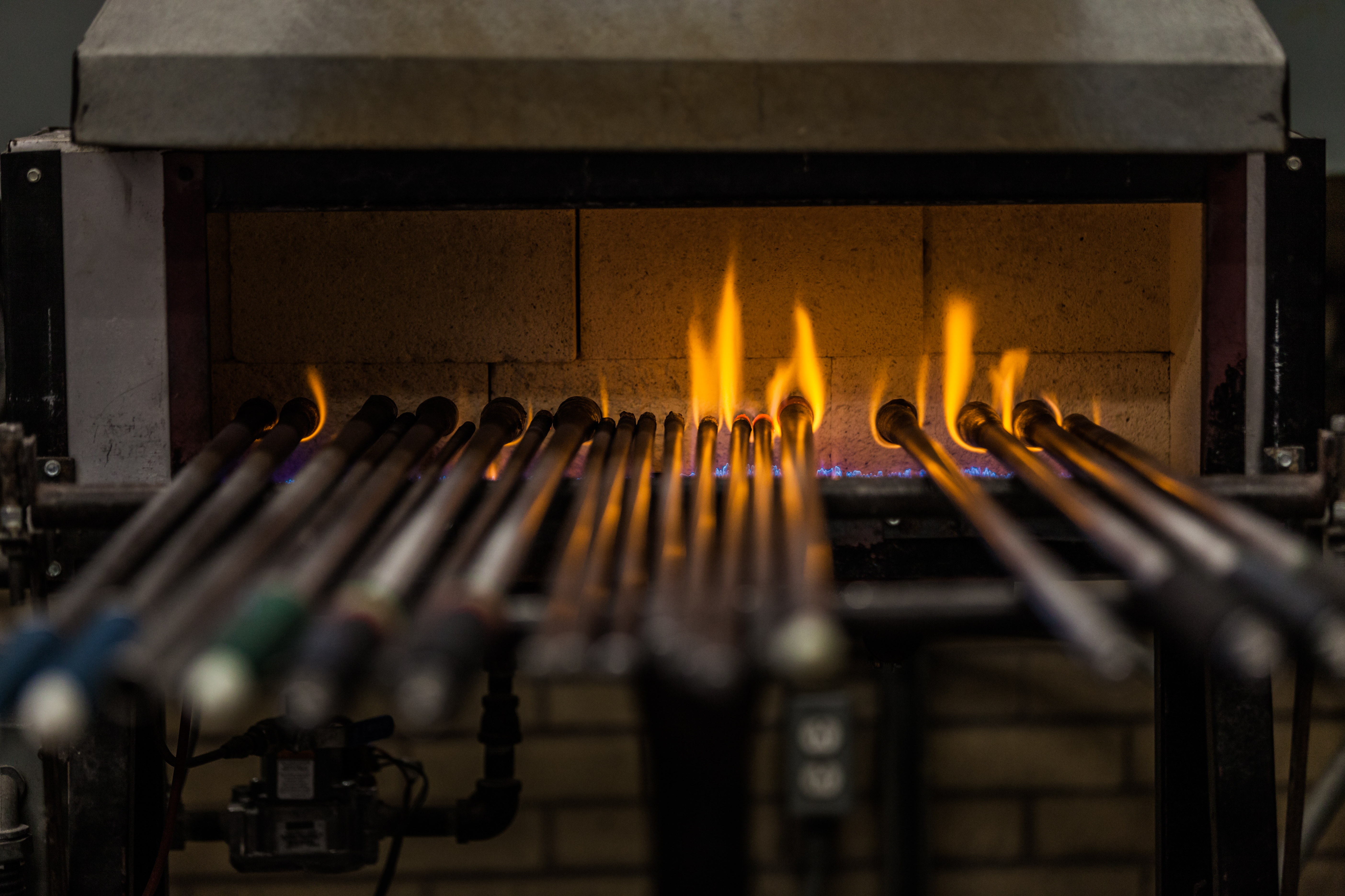 https://watt.co.uk/wp-content/uploads/2020/04/blowing-pipes-kept-warm-in-the-propane-oven-PTTSQK9.jpg